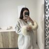 Manteau manches fourrure beige court