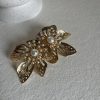 Boucle d’oreille feuille perlée