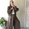 Manteau court à carreaux  à motif pied-de-poule marron et verte