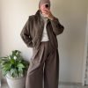 Manteau court à carreaux  à motif pied-de-poule marron et verte