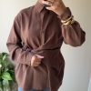 cjykmlnuyxbjagf0lzezlju5ljaunjagkglqag9uzte3lde7iglpuyaxoc42lji7igd6axapiai-31 Chemise à nouer marron