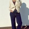 Gilet beige à gros bouton doré – Élégance et douceur pour l’automne