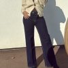 Gilet beige à gros bouton doré – Élégance et douceur pour l’automne