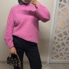 Pull oversize femme – rose doux et lumineux