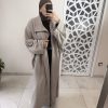 Manteau long en laine taupe- Élégance intemporelle et chaleur raffinée
