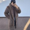 Manteau long en fausse fourrure – chaleur, élégance et confort absolu marron