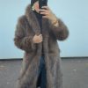 Manteau long en fausse fourrure – chaleur, élégance et confort absolu marron