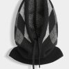 Cagoule tricot à motif argyle – style rétro chic et confort d’hiver Noire