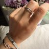 img_7115-2 Bague en acier inoxydable – design clou serti de strass