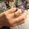 img_7135 Bague en acier inoxydable doré – design clou serti de strass