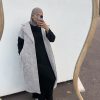 img_7487-2 Manteau beige long sans manches matelassé avec ceinture