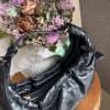Sac à main tressé en similicuir noir – Élégance et modernité
