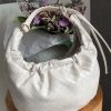 Sac à main tressé en similicuir beige – Élégance et modernité