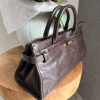 Sac à main marron en simili cuir – Élégance et raffinement