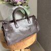 Sac à main marron en simili cuir – Élégance et raffinement