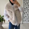 Gilet sans manches en fausse fourrure beige