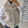 Gilet sans manches en fausse fourrure beige