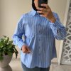 cjukmvnuyxbjagf0lzezljy0ljmumcaoavbob25lmtcsmtsgau9tidi2ljaumtsgz3ppcckgag-10 Chemise à rayures bleue