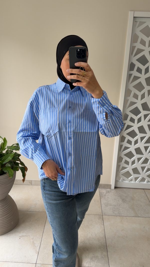 cjukmvnuyxbjagf0lzezljy0ljmumcaoavbob25lmtcsmtsgau9tidi2ljaumtsgz3ppcckgag-10 Chemise à rayures bleue